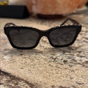 CHANEL Black Cat-Eye Sunglasses with Glossy Finish